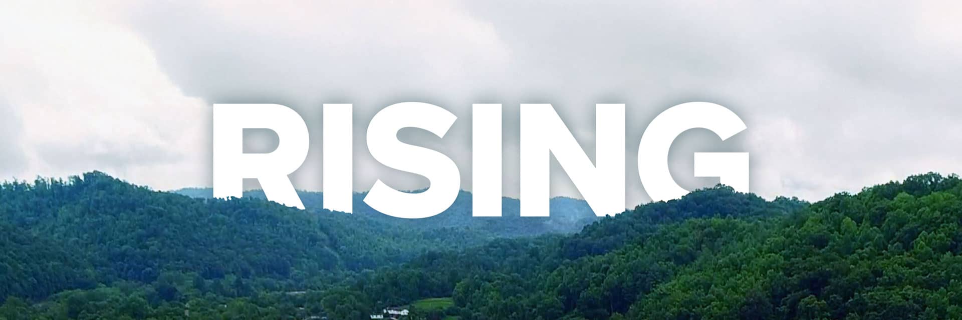 Go to home - A Kentucky treeline with the word RISING near the top.