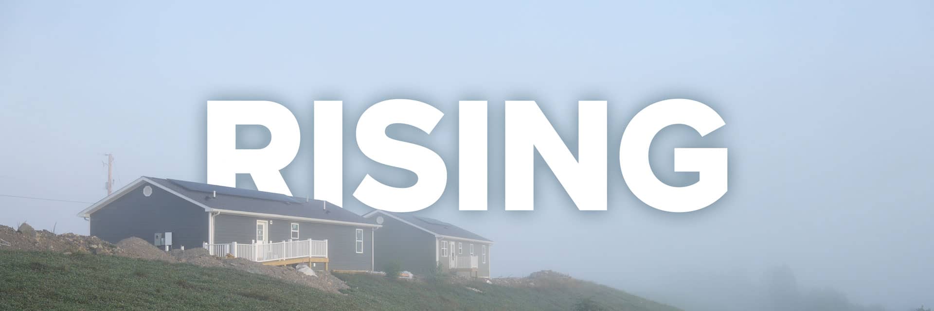 Go to home - A home built on a hilltop with the word RISING partially behind the rooftop.